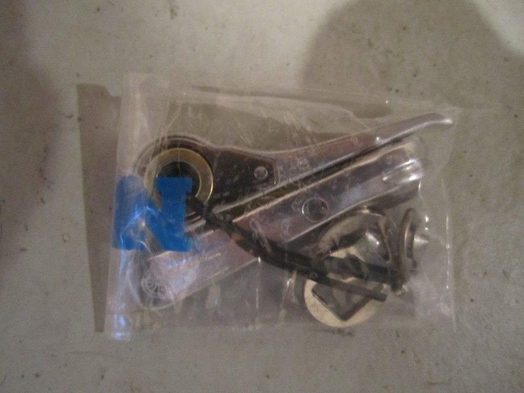 Silver downtube shifters in package